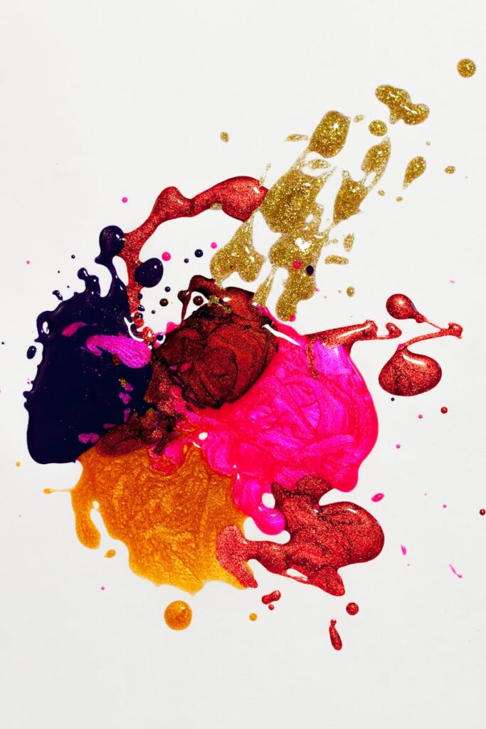 Colorful abstract paint splash on white background, capturing creative expression.